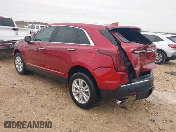 2023 Cadillac XT5 FWD Luxury z VIN 1GYKNAR42PZ147121, wystawiony jako IAAI lot #41315848 z przebiegiem 10 444 mil mil oraz . Historia ofert i sprzedaży dostępna na DreamBid. Obrazek 3.