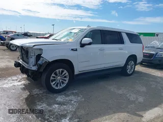 2021 GMC Yukon XL SLT with VIN 1GKS1GKD6MR100561, listed as a IAAI auction lot 41609215 with 37,429 mi miles and . Bid and sale history available at carsss.com. Image 14.