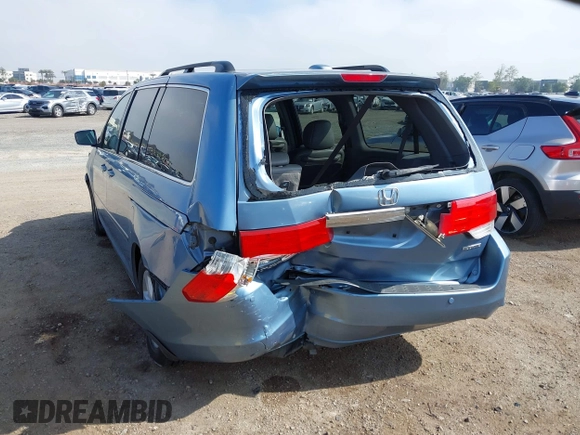 2010 Honda Odyssey Touring with VIN 5FNRL3H92AB056186, listed as a IAAI auction lot 41851386 with 199,109 mi miles. Bid and sale history available at carsss.com. Image 6.