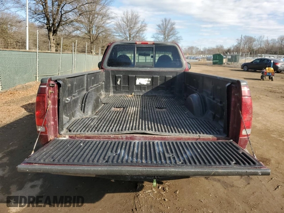 1999 Ford F-150 with VIN 1FTRF17W7XNA44872, listed as a Copart auction lot 41815695 with 182,678 mi miles and Salvage title. Bid and sale history available at DreamBid. Image 11.