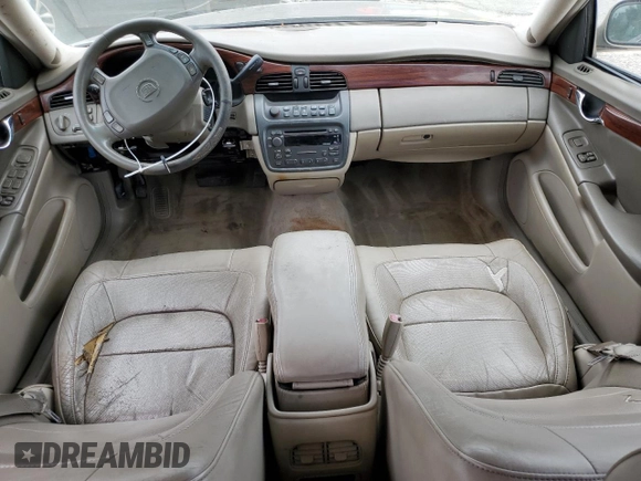 2004 Cadillac DeVille z VIN 1G6KD54Y64U134605, wystawiony jako Copart lot #56258215 z przebiegiem 256 662 mil mil oraz Szkody całkowita. Historia ofert i sprzedaży dostępna na DreamBid. Obrazek 10.