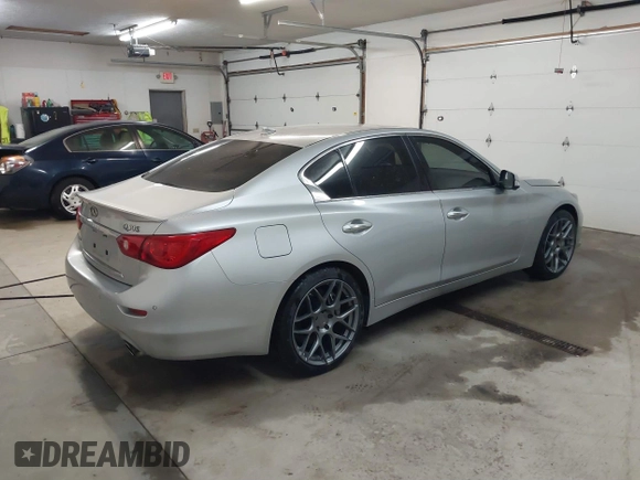 2014 Infiniti Q50 Sport with VIN JN1BV7AR0EM695972, listed as a IAAI auction lot 41732229 with 134,654 mi miles and . Bid and sale history available at DreamBid. Image 4.