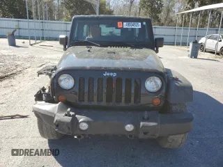 2009 Jeep Wrangler Unlimited X with VIN 1J4GA391X9L788932, listed as a Copart auction lot 49004925 with 105,674 mi miles and Salvage Title. Bid and sale history available at carsss.com. Image 5.