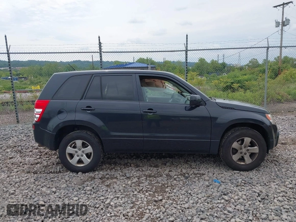 2012 Suzuki Grand Vitara Premium z VIN JS3TD0D6XC4100539, wystawiony jako IAAI lot #42384659 z przebiegiem 143 711 mil mil oraz . Historia ofert i sprzedaży dostępna na DreamBid. Obrazek 13.
