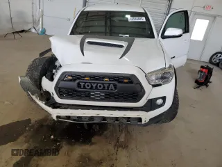 2018 Toyota Tacoma SR z VIN 3TMCZ5AN7JM178223, wystawiony jako Copart lot #49588605 z przebiegiem 179 064 mil mil oraz Szkoda całkowita • Salvage title. Historia ofert i sprzedaży dostępna na DreamBid. Obrazek 11.
