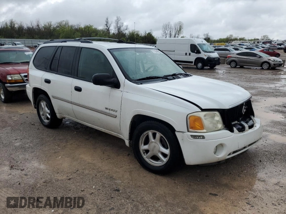 2006 GMC Envoy SLE z VIN 1GKDT13S562124794, wystawiony jako Copart lot #51649085 z przebiegiem 152 844 mil mil oraz Szkoda całkowita • Salvage title. Historia ofert i sprzedaży dostępna na DreamBid. Obrazek 4.