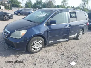 2005 Honda Odyssey EX with VIN 5FNRL38455B135555, listed as a IAAI auction lot 42080079 with 149,468 mi miles and . Bid and sale history available at carsss.com. Image 21.