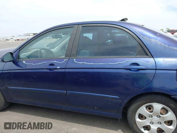 2007 Kia Spectra EX z VIN KNAFE122775468060, wystawiony jako IAAI lot #42225413 z przebiegiem 124 306 mil mil oraz . Historia ofert i sprzedaży dostępna na DreamBid. Obrazek 14.