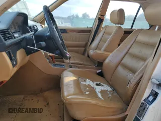 1991 Mercedes-Benz 300 300E with VIN WDBEA30D2MB339701, listed as a Copart auction lot 80088704 with 207,505 mi miles and Salvage Title. Bid and sale history available at carsss.com. Image 7.