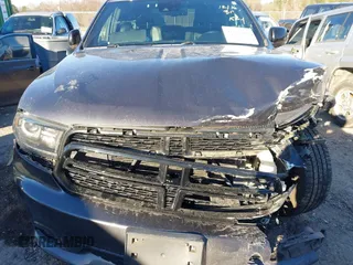 2016 Dodge Durango R/T with VIN 1C4SDJCTXGC387559, listed as a IAAI auction lot 41175018 with 64,692 mi miles and . Bid and sale history available at DreamBid. Image 12.
