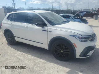 2022 Volkswagen Tiguan SE R-Line Black with VIN 3VVCB7AX8NM009403, listed as a Copart auction lot 52720885 with 74,063 mi miles and Salvage title. Bid and sale history available at DreamBid. Image 4.