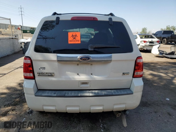 2010 Ford Escape Limited with VIN 1FMCU9EG5AKD32965, listed as a Copart auction lot 59765695 with Not provided miles and Salvage title. Bid and sale history available at DreamBid. Image 6.