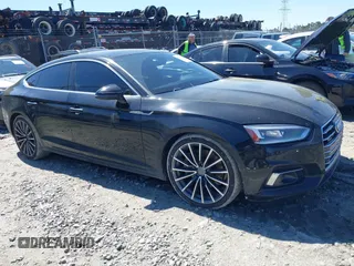 2018 Audi A5 Sportback Prestige z VIN WAUCNCF54JA128091, wystawiony jako IAAI lot #41810947 z przebiegiem 124 877 mil mil oraz . Historia ofert i sprzedaży dostępna na DreamBid. Obrazek 1.