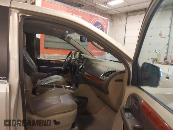 2013 Chrysler Town & Country Touring L with VIN 2C4RC1CG3DR606952, listed as a IAAI auction lot 42189429 with 145,654 mi miles and . Bid and sale history available at DreamBid. Image 5.