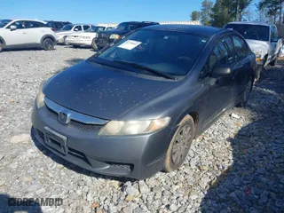 2010 Honda Civic Sdn DX-VP with VIN 19XFA1F33AE069806, listed as a IAAI auction lot 41770002 with 288,719 mi miles. Bid and sale history available at carsss.com. Image 2.