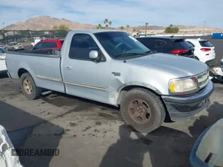 1997 Ford F-150 with VIN 1FTEF17W3VLA19510, listed as a IAAI auction lot 41711010 with 214,984 mi miles and . Bid and sale history available at DreamBid. Image 1.