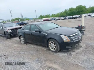 2009 Cadillac CTS RWD with VIN 1G6DF577190137609, listed as a IAAI auction lot 42196209 with 111,843 mi miles and . Bid and sale history available at DreamBid. Image 1.