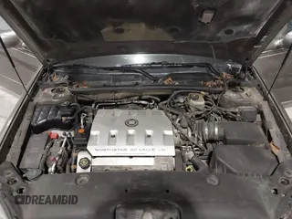 2000 Cadillac DeVille z VIN 1G6KD54Y6YU265538, wystawiony jako IAAI lot #41748755 z przebiegiem 159 676 mil mil oraz . Historia ofert i sprzedaży dostępna na DreamBid. Obrazek 10.