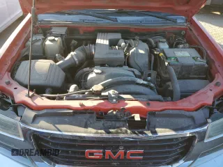 2012 GMC Canyon z VIN 1GTH5PFE6C8113599, wystawiony jako Copart lot #84532964 z przebiegiem 139 011 mil mil oraz Szkoda całkowita • Salvage title. Historia ofert i sprzedaży dostępna na DreamBid. Obrazek 11.