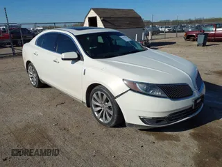 2013 Lincoln MKS with VIN 1LNHL9DK9DG603631, listed as a IAAI auction lot 42021741 with 166,852 mi miles and . Bid and sale history available at DreamBid. Image 1.