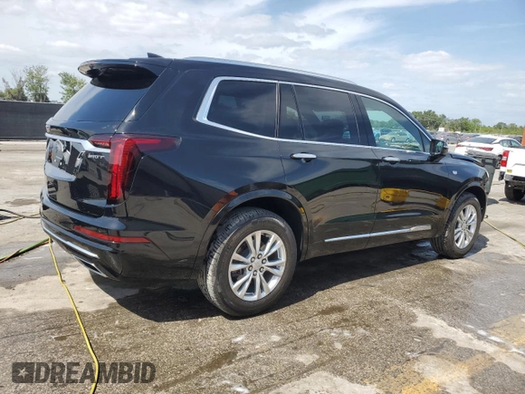 2023 Cadillac XT6 FWD Luxury z VIN 1GYKPAR45PZ187400, wystawiony jako Copart lot #54562335 z przebiegiem 16 953 mil mil oraz Szkoda całkowita • Salvage title. Historia ofert i sprzedaży dostępna na DreamBid. Obrazek 3.