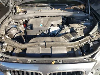 2013 BMW X1 28i with VIN WBAVM1C53DVW43228, listed as a IAAI auction lot 41301776 with 61,323 mi miles. Bid and sale history available at carsss.com. Image 10.