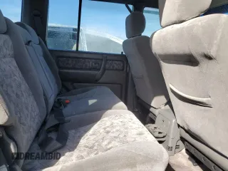 2000 Isuzu Trooper S z VIN JACDS58XXY7J11716, wystawiony jako Copart lot #76685304 z przebiegiem 92 828 mil mil oraz Nie do naprawy. Historia ofert i sprzedaży dostępna na DreamBid. Obrazek 11.