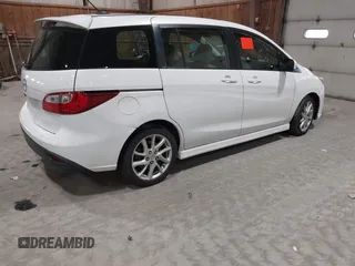 2012 Mazda 5 Grand Touring with VIN JM1CW2DL9C0100114, listed as a IAAI auction lot 42038998 with 160,651 mi miles and . Bid and sale history available at DreamBid. Image 4.