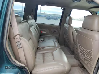 1996 GMC Yukon with VIN 1GKEK13R6TJ747606, listed as a Copart auction lot 80763434 with 308,837 mi miles and Salvage Title. Bid and sale history available at carsss.com. Image 11.