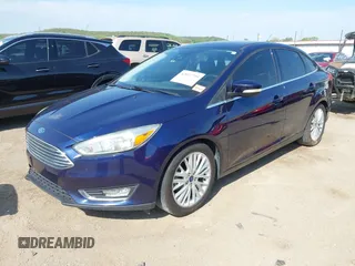 2017 Ford Focus Titanium with VIN 1FADP3J29HL204892, listed as a IAAI auction lot 42032705 with 119,028 mi miles and . Bid and sale history available at DreamBid. Image 2.