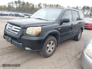 2007 Honda Pilot EX-L with VIN 2HKYF18517H513293, listed as a IAAI auction lot 41957031 with 264,875 mi miles. Bid and sale history available at carsss.com. Image 2.