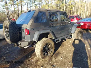2018 Jeep Wrangler JK Unlimited Altitude with VIN 1C4BJWEG1JL842456, listed as a IAAI auction lot 41123988 with 55,310 mi miles. Bid and sale history available at carsss.com. Image 4.