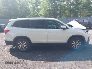 2021 Honda Pilot EX with VIN 5FNYF6H38MB072297, listed as a IAAI auction lot 42561276 with 119,172 mi miles and . Bid and sale history available at DreamBid. Image 13.