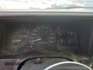 1999 GMC Yukon with VIN 1GKEC13R7XJ802387, listed as a Copart auction lot 82819934 with 438,574 mi miles and Salvage Title. Bid and sale history available at carsss.com. Image 9.