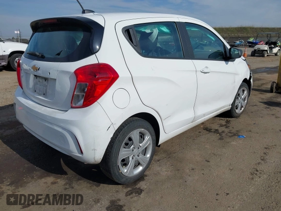 2022 Chevrolet Spark LS with VIN KL8CB6SA3NC036523, listed as a IAAI auction lot 41421387 with 59,801 mi miles and . Bid and sale history available at DreamBid. Image 4.