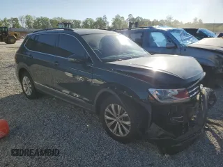 2018 Volkswagen Tiguan SEL с VIN 3VV3B7AX7JM008446, выставлен на аукционе Copart как лот 53435775 с пробегом 93 776 миль миль и Списание • Salvage title. История ставок и продаж доступна на DreamBid. Изображение 4.