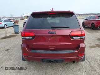 2020 Jeep Grand Cherokee Altitude z VIN 1C4RJFAG9LC157516, wystawiony jako IAAI lot #41796424 z przebiegiem 85 720 mil mil oraz . Historia ofert i sprzedaży dostępna na DreamBid. Obrazek 16.