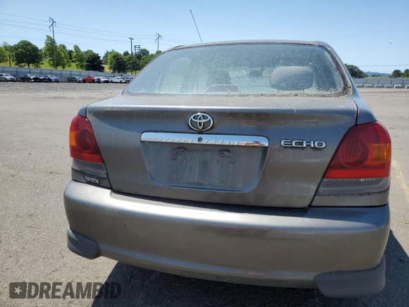 2004 Toyota ECHO with VIN JTDBT123140331964, listed as a Copart auction lot 59156135 with 180,834 mi miles and Salvage title. Bid and sale history available at DreamBid. Image 6.