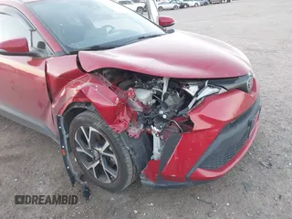 2022 Toyota C-HR XLE with VIN NMTKHMBX8NR147558, listed as a IAAI auction lot 41845282 with 32,875 mi miles and . Bid and sale history available at DreamBid. Image 6.
