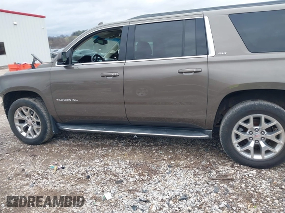 2015 GMC Yukon XL SLT with VIN 1GKS2HKC6FR582574, listed as a IAAI auction lot 41187550 with 185,737 mi miles. Bid and sale history available at carsss.com. Image 15.