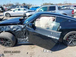 2023 Nissan Z Performance with VIN JN1BZ4BH9PM310761, listed as a IAAI auction lot 41630494 with 6,541 mi miles and . Bid and sale history available at DreamBid. Image 14.