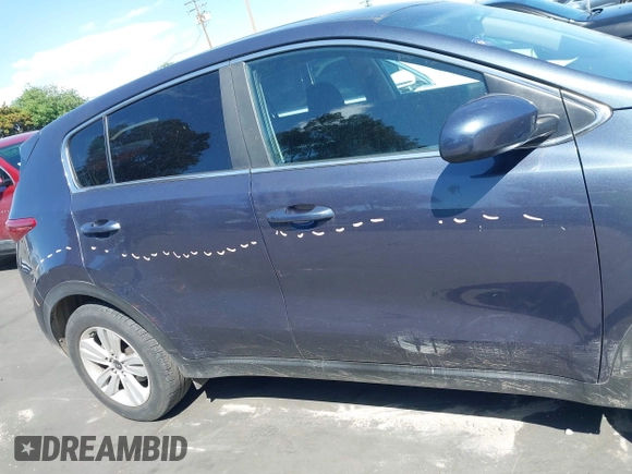 2019 Kia Sportage LX with VIN KNDPM3ACXK7513831, listed as a IAAI auction lot 41969252 with 99,388 mi miles. Bid and sale history available at carsss.com. Image 14.