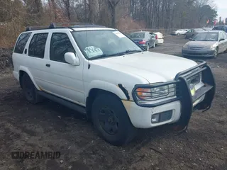 2001 Nissan Pathfinder LE z VIN JN8DR07Y21W529567, wystawiony jako IAAI lot #41667853 z przebiegiem 101 631 mil mil oraz . Historia ofert i sprzedaży dostępna na DreamBid. Obrazek 1.
