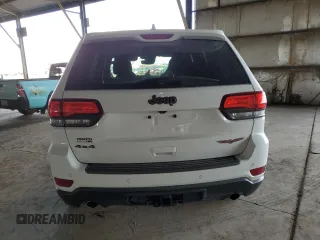 2020 Jeep Grand Cherokee Trailhawk with VIN 1C4RJFLGXLC400313, listed as a Copart auction lot 53649565 with 51,717 mi miles and Salvage title. Bid and sale history available at DreamBid. Image 6.