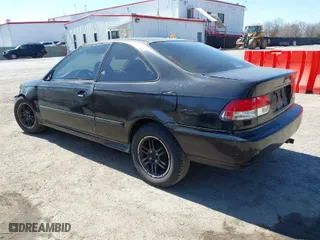 1997 Honda Civic EX with VIN 1HGEJ8245VL054080, listed as a IAAI auction lot 41880386 with 286,568 mi miles. Bid and sale history available at carsss.com. Image 3.