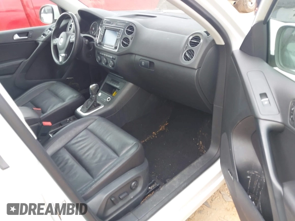 2016 Volkswagen Tiguan S with VIN WVGBV7AXXGW585445, listed as a IAAI auction lot 42083377 with 111,011 mi miles and . Bid and sale history available at DreamBid. Image 5.