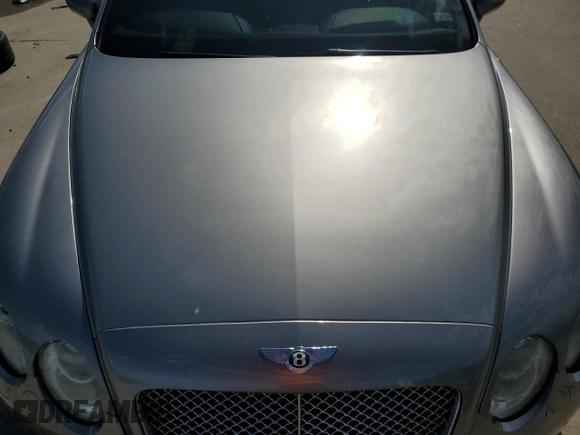 2006 Bentley Continental GT GT z VIN SCBCR63W76C037174, wystawiony jako Copart lot #79240794 z przebiegiem 103 577 mil mil oraz Nie do naprawy. Historia ofert i sprzedaży dostępna na DreamBid. Obrazek 11.