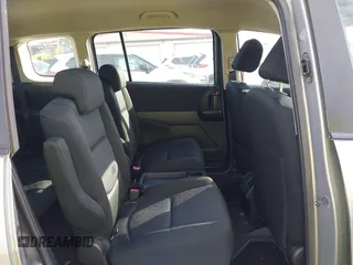 2010 Mazda 5 Sport with VIN JM1CR2W36A0388353, listed as a IAAI auction lot 42121004 with 169,658 mi miles. Bid and sale history available at carsss.com. Image 8.