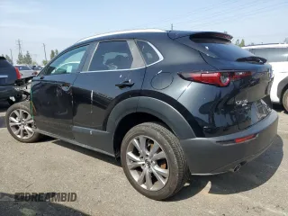 2023 Mazda CX-30 S Select with VIN 3MVDMBBM7PM582394, listed as a Copart auction lot 59786415 with Not provided miles and Salvage title. Bid and sale history available at DreamBid. Image 2.