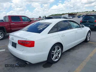 2014 Audi A6 Premium Plus with VIN WAUDFAFC6EN098448, listed as a IAAI auction lot 42579526 with 94,189 mi miles and . Bid and sale history available at DreamBid. Image 4.